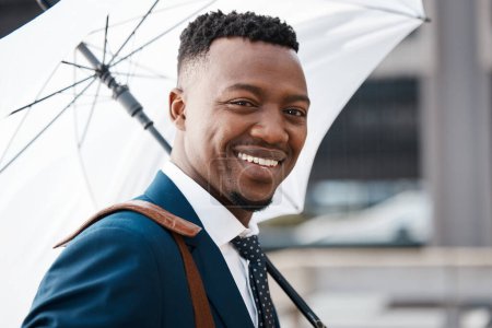 Photo for Black man, smile and umbrella in portrait with professional for life insurance with policies. Happiness, cover and outside with beneficiary, premium and corporate for benefits with people in business. - Royalty Free Image