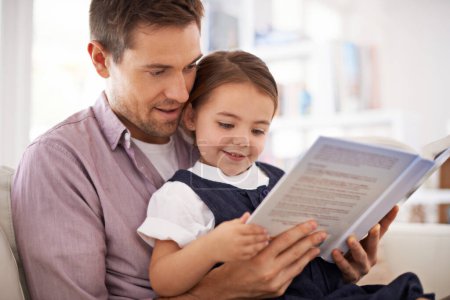 Photo for Father, child with book for reading and knowledge, happy with bonding at home and storytelling for education. Man, young girl and story time for fantasy and learn, love and care together in lounge. - Royalty Free Image