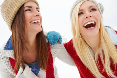 Photo for Winter, vacation and friends with laughing in snow for travel, weekend adventure and holiday in Canada. Smile, women and happy with funny joke in cold weather for comedy, journey and tourism together. - Royalty Free Image