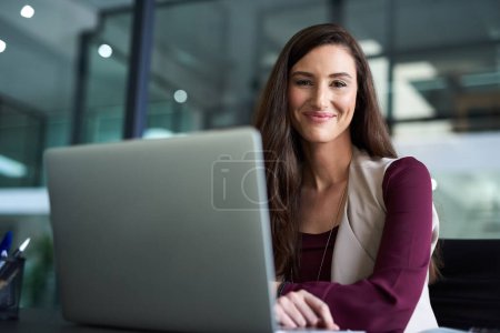 Photo for Woman, office and smile with laptop in portrait for company with pride, confident and satisfied with career growth. Female person, employee and happy in desk with computer at work as hr manager. - Royalty Free Image