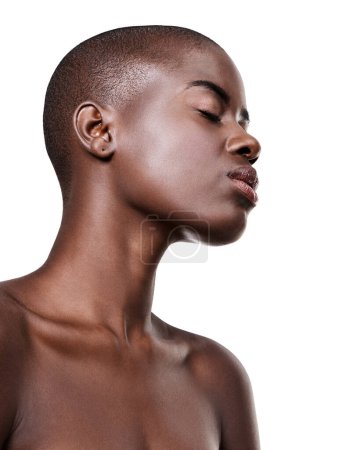 Photo for African, woman and profile of beauty with skincare in studio on white background with glow on skin from dermatology. Calm, model and cosmetics on face with healthy treatment in spa or mockup space. - Royalty Free Image