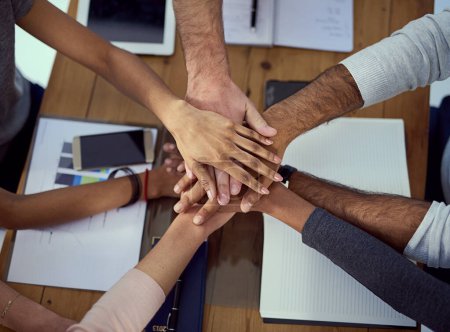 Photo for Hands stack, group and support at desk with documents, diversity and ux design with motivation for goals. People, teamwork and cheers with solidarity, planning and link with synergy at workplace. - Royalty Free Image