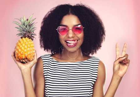 Photo for Peace sign, portrait and black woman with pineapple, studio or detox on pink background. Health, nutrition and gut digestion for weight loss and vitamins for female model, vegan and vitamin for fiber. - Royalty Free Image