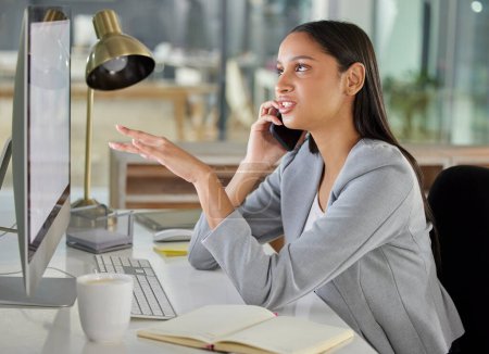Businesswoman, phone call and computer at office as assistant for booking meeting, appointment or schedule. Female person, receptionist and confirmation with clients for agenda, admin or planning.