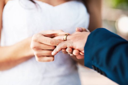 Photo for Couple, hands and wedding ring in outdoors, ceremony and symbol for promise of loyalty or commitment. People, fingers and unity or icon for partnership, support and trust in marriage or relationship. - Royalty Free Image