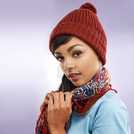 Photo for Fashion, woman and portrait in winter, studio and beanie for warm on colour background. Accessory, clothing or capsule wardrobe with style for cold weather, hat or thrift scarf for happy female model. - Royalty Free Image