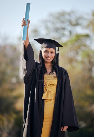 Photo for Graduation, celebration and portrait of woman with scroll on university campus for education achievement. Happy, future and female student graduate with college diploma, degree or certificate - Royalty Free Image