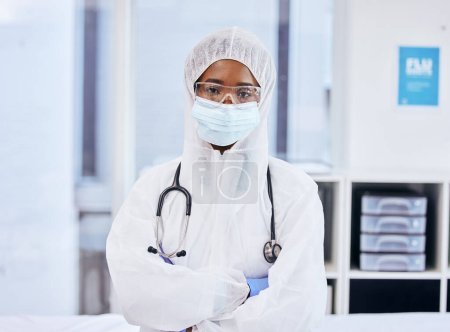Portrait, black woman or doctor with ppe, mask and gloves in hospital for safety, covid research and vaccine. Protection, female person or healthcare worker in clinic for security, hygiene or shield.