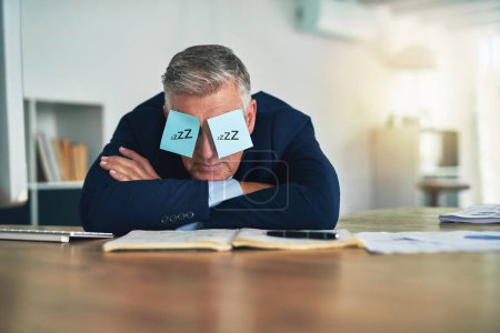 Photo for Sleeping, sticky notes and eyes of businessman with tired, burnout and fatigue of a mature professional in office. Paper, mental health and entrepreneur with nap and corporate break at a company. - Royalty Free Image