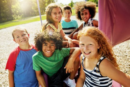 Photo for Children, playground and portrait of group in summer to relax with friends at park on vacation. Happy, holiday and kids at party with games or smile outdoor on break at school recess at academy. - Royalty Free Image