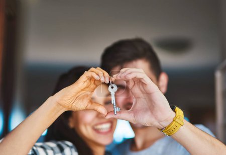 Photo for New house, heart in hands and couple with keys for property, moving day and home investment. Homeowner, real estate and happy man and woman with keychain for mortgage, purchase and rental apartment. - Royalty Free Image