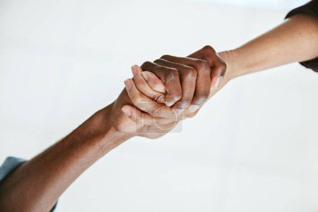 Photo for Business people, handshake and agreement deal or support with solidarity, commitment or unity. Trust, below and partnership respect with white background or corporate growth, help or community. - Royalty Free Image