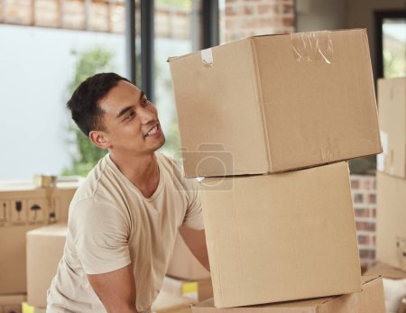 Photo for Man, box and happy in new home, logistics or real estate for moving, beginning and commitment for mortgage. Delivery, and cardboard package and excited for property or apartment and renovation. - Royalty Free Image