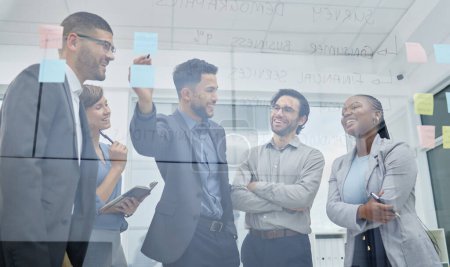 Photo for Business people, meeting and sticky notes on glass wall in boardroom for teamwork and planning. Brainstorming, employees or group together in office for collaboration, support and thinking of ideas. - Royalty Free Image
