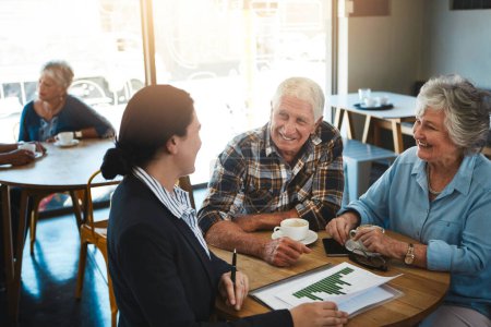 Photo for Senior couple, financial advisor and talking with paperwork, relax conversation and retirement planning. Insurance, savings and investment with professional, pensioner people and discussion in cafe. - Royalty Free Image