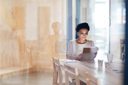 Photo for Business woman, tablet and reading in conference room with tech and digital planning for law case. Research, professional and worker on the internet and website at an attorney firm with mockup space. - Royalty Free Image