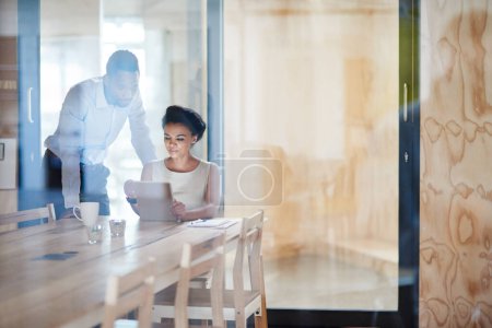 Photo for Business woman, tablet and office collaboration with staff and planning of tech for research on law case. Digital, labor lawyer and teamwork with discussion and desk in conference room with glass. - Royalty Free Image
