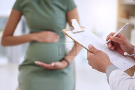 Photo for Hands, doctor and writing on clipboard with pregnant woman for growth, health or development in clinic. Person, healthcare consulting and patient with notes, checklist or medical report for pregnancy. - Royalty Free Image