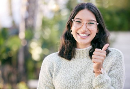 Photo for Park, portrait or happy woman with thumbs up for success, good job or like for feedback in nature. Positive icon, great gesture or excited girl with thank you smile, yes sign or vote for okay review. - Royalty Free Image
