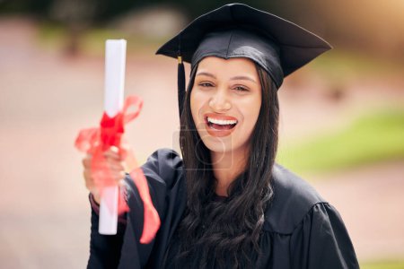 Photo for Graduation, portrait and excited woman celebrate with diploma for achievement and success at college campus. Face, smile and graduate with certificate scroll outdoor at university for education award. - Royalty Free Image
