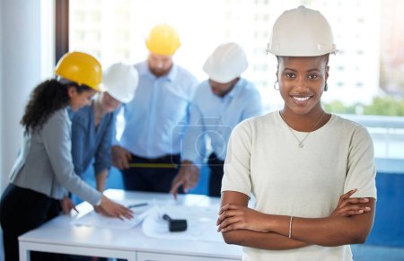 Photo for Black woman, portrait and arms crossed for engineering with teamwork, construction meeting and support in city office. Female manager, staff and pride for architecture with cooperation and blueprint. - Royalty Free Image