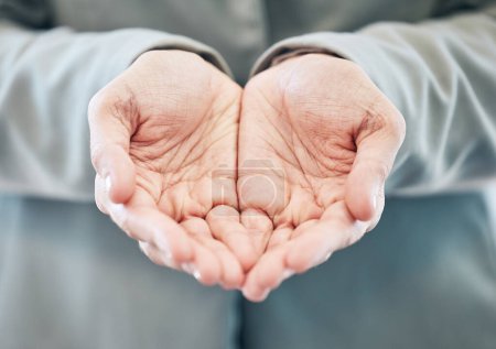 Photo for Poverty, man and hands to care for offer with help, charity and support from community by donations for hope. Poor, person and palms with asking gesture, thank you and prayer, gratitude and faith. - Royalty Free Image