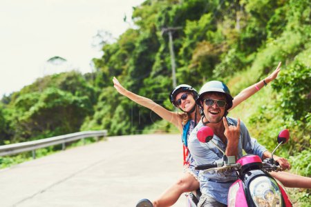 Photo for Couple, scooter and vacation with road trip, excited or happiness with transport, India or eco friendly. Joy, man or woman with helmet, holiday or explore with adventure, travel or journey with ebike. - Royalty Free Image