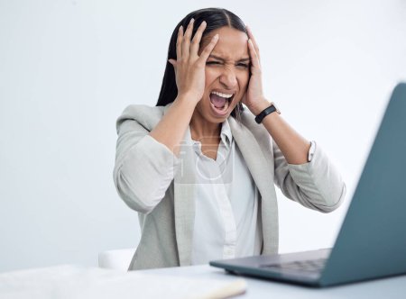 Photo for Stress, screaming and business woman on laptop for disaster, financial crisis or reading bankruptcy email in office. Angry, depression and professional shout for debt, tax or agent frustrated at fail. - Royalty Free Image