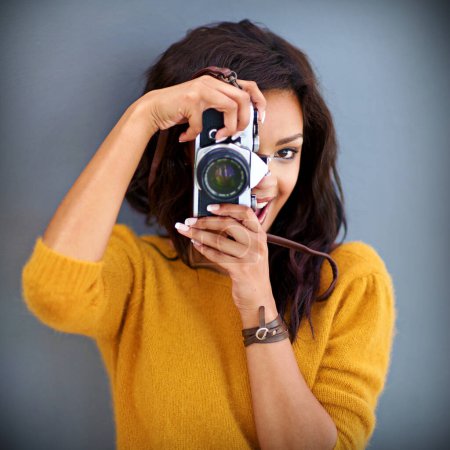 Photo for Portrait, happy and woman with retro camera by studio background for shooting photo, image or picture. Mockup space, female photographer for creative memory, lens and focus with vintage equipment. - Royalty Free Image