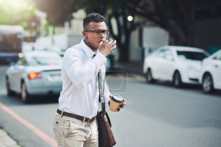 Foto de Business, travel and man with whistle for taxi, attention or public transport in city on morning work commute. Bus, stop and person with mouth sound on sidewalk for car, calling and waiting for cab. - Imagen libre de derechos