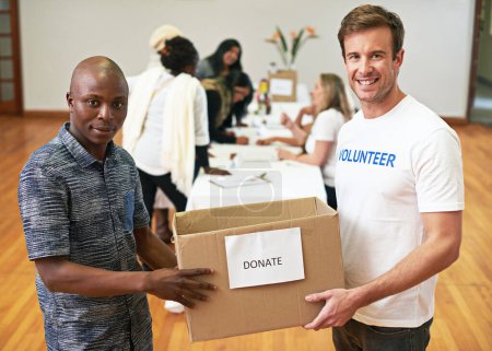People, volunteer and portrait for donation, box and kindness at church, care and accountability with diversity. Men, package and helping hand with commitment, support and choice for call to action.