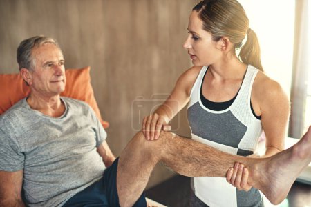Photo for Physiotherapist, old man and knee pain or joint recovery for inflammation treatment, mobility or flexibility. Woman, client and consultation talking for retirement plan with arthritis, health or leg. - Royalty Free Image