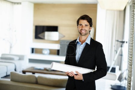Photo for Business man, portrait and confidence with blueprint for planning, building design or floor plan on desk. Home office, architecture or male architect for project renovation, real estate or ideas. - Royalty Free Image