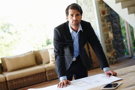 Photo for Portrait, businessman or manager with blueprint for planning, building design or floor plan on desk. Home office, architecture or male architect with paper for project renovation, real estate or idea. - Royalty Free Image