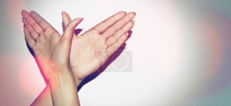 Photo for Sign, hands and woman for birds, freedom or flying with emoji, wings and gesture. Signals, fingers and girl with symbol for icon, emoticon and expression for angel, soaring and liberty on background. - Royalty Free Image