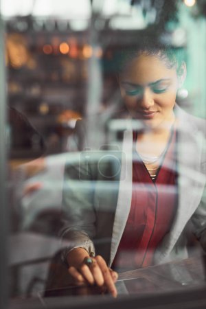Photo for Business woman, tablet and coffee shop window with smile from remote work and finance consulting freelancer. Cafe, technology and typing for job and online on website and internet at restaurant. - Royalty Free Image