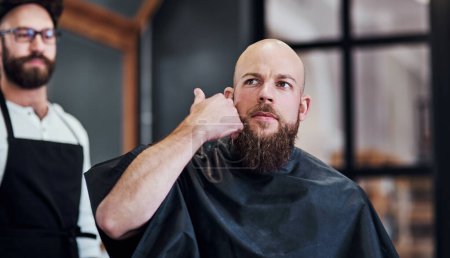 Photo for Man, barber and customer in barbershop for beard care, grooming and facial hair maintenance for shaping and lining up. Trim, client and cosmetics in chair with professional, clean and male wellness. - Royalty Free Image
