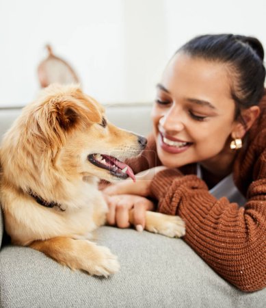 Photo for Smile, woman and dog on sofa with love for attention, relax and happiness together for support. Best friends, pet and girl on couch for kindness with loyalty, animal adoption and wellness in lounge. - Royalty Free Image