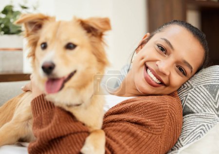 Photo for Portrait, dog and woman on couch with love for happiness, relax and playing together for support. Best friend, pet and happy girl on sofa for kindness with loyalty, wellness and animal care in home. - Royalty Free Image