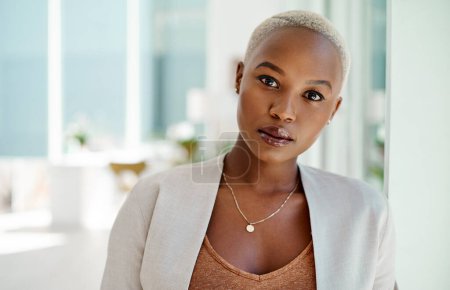 Photo for Portrait, African woman and serious in office with pride for career, small business and startup company. Internship, female person and secretary in agency with confidence for admin job in Los Angeles. - Royalty Free Image
