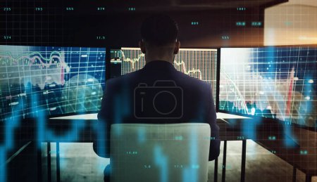Photo for Computer screen, double exposure and stock market with business man in office at night from back. Finance, investment and portfolio with broker at work for asset management, data analysis or economy. - Royalty Free Image