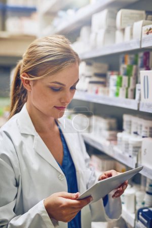 Photo for Pharmacy, woman or pharmacist with tablet for research or checking medical prescription on shelf. Internship, healthcare or doctor reading online checklist in clinic for drugstore inventory storage. - Royalty Free Image