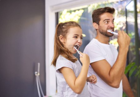 House, brushing teeth and father with girl, cleaning mouth and morning routine with grooming. Family, dad and daughter with fresh breath, dental hygiene and oral care with dental wellness and playful.
