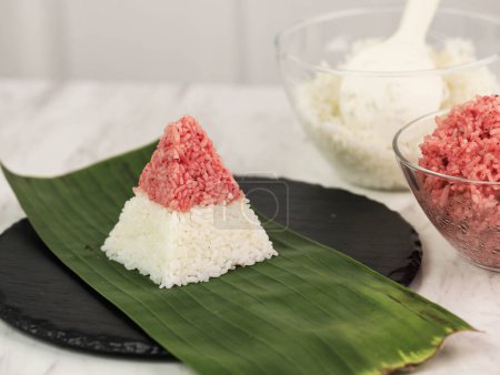 Foto de Red and White  Rice Called Nasi Tumpeng Same as Indonesian National Flag for Independence Day Celebration at 17 August - Imagen libre de derechos