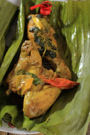 Photo for Close Up Pepes Ayam (Pais Hayam) is Indonesian Steamed Curry Chicken with Traditional Recipe - Royalty Free Image