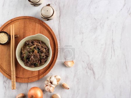 Photo for Asian Style Beef in Teriyaki Sauce with Sesame Seed, Top View, Horizontal with Copy Space on Marble Top - Royalty Free Image