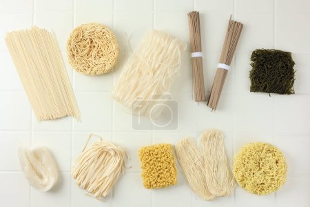 Top View Various Dried Asian Noodle, Ramen, Ramyeon, Pho, Egg Noodles, Buckwheat, Rice Noodle, Flat Noodle
