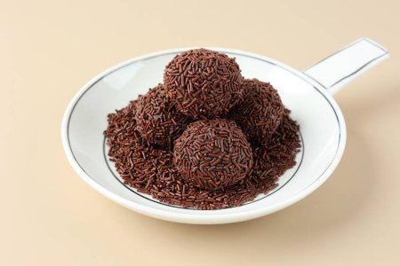 Photo for Brigadeiro, Traditional Brazilian Dessert Made of Condensed Milk, Cocoa Powder, Butter, and Chocolate Sprinkles or Meises - Royalty Free Image