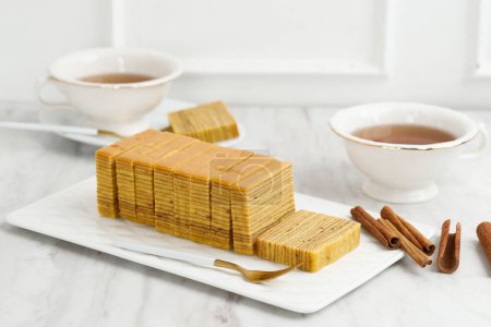 Photo for Lapis Legit, Sliced Thousand  Layer Cinnamon Butter Cake, Indonesian Cake usually Served on Imlek, Lebaran - Royalty Free Image