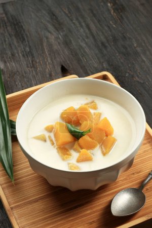 Photo for Kolak Labu or Coconut Milk Stewed Pumpkin, Indonesian and Thai Sweet Dessert. Ramadan Takjil Ifthar Food - Royalty Free Image